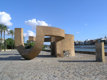 Cycling north along the river in Seville